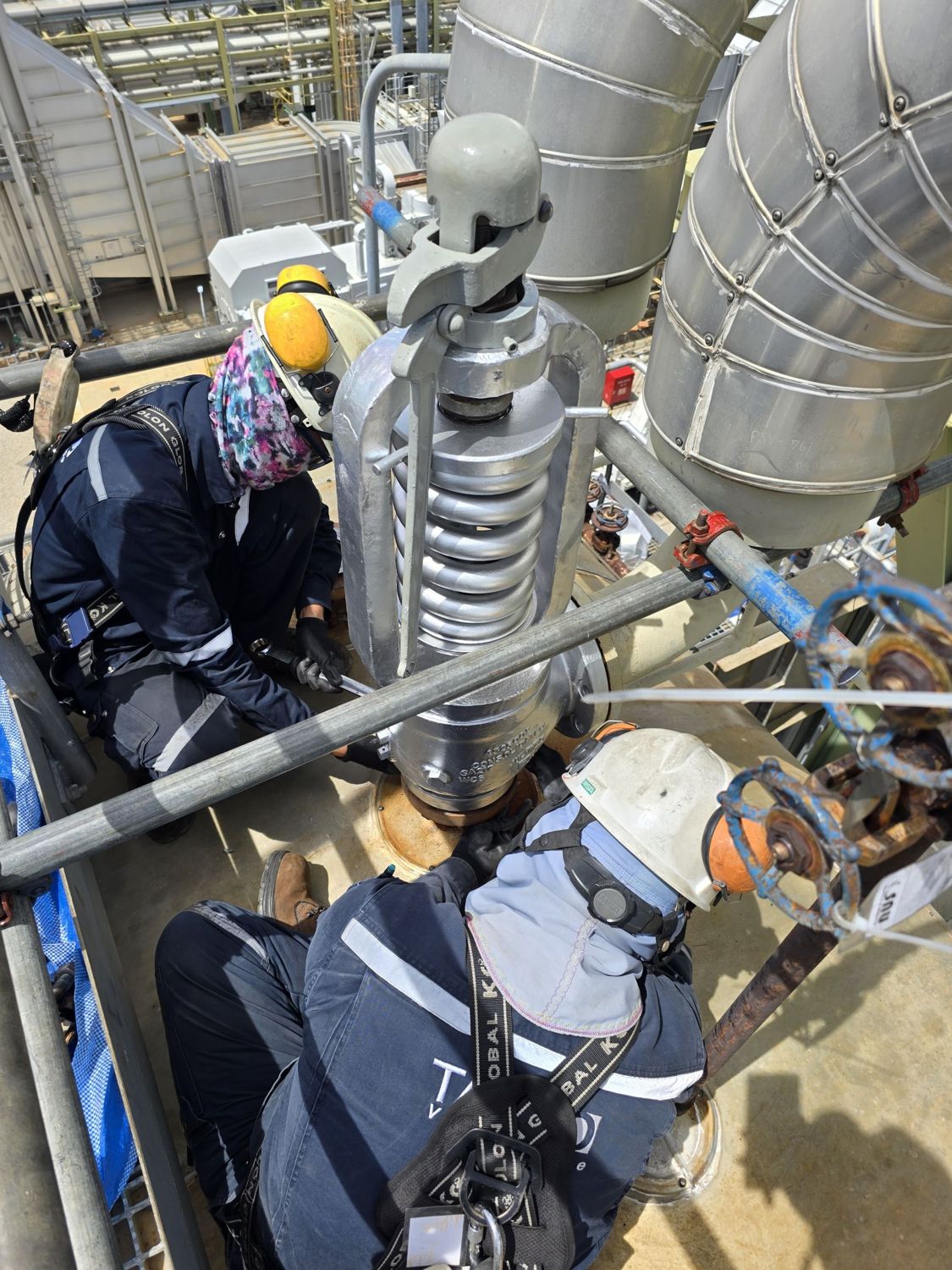 Crew torquing a safety valve at height